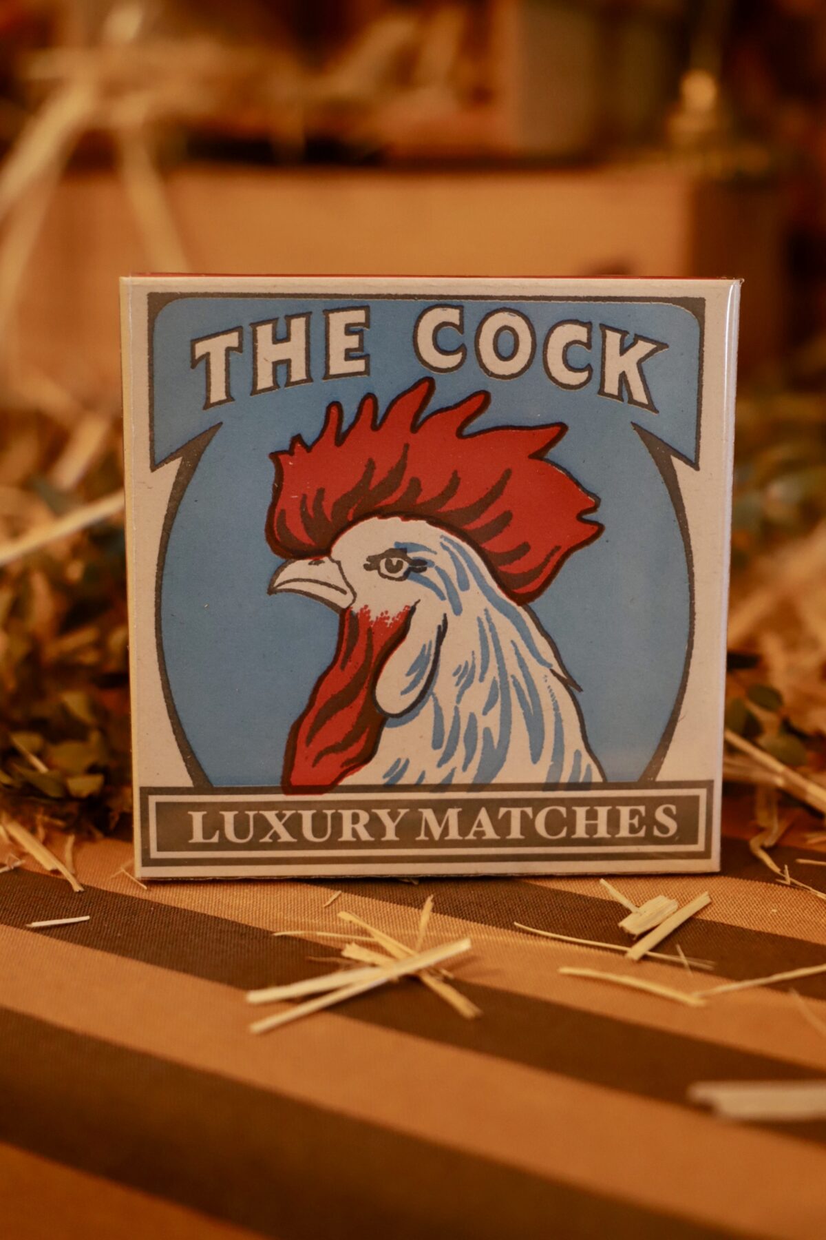 Caja cerillas the cock